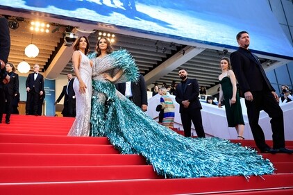 Aishwarya Rai Bachchan (R) pose with US actress, producer, director Eva Longoria as they arrive for the screening of the film Kinds Of Kindness at the 77th edition of the Cannes Film Festival in Cannes. (AFP) Aishwarya Rai Bachchan (R) pose with US actress, producer, director Eva Longoria as they arrive for the screening of the film Kinds Of Kindness at the 77th edition of the Cannes Film Festival in Cannes. (AFP)