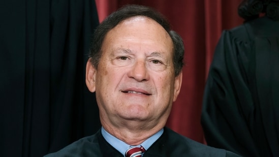 An upside-down American flag, a symbol associated with former President Donald Trump's false claims of election fraud, was displayed outside the home of Supreme Court Justice Samuel Alito in January 2021, The New York Times reported May 16. (AP Photo/J. Scott Applewhite, File) (AP)