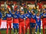 Royal Challengers Bengaluru's players celebrate after winning the Indian Premier League (IPL) Twenty20 cricket match against Chennai Super Kings 