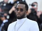 (FILES) Sean Combs 'P. Diddy' arrives for the 2018 Met Gala on May 7, 2018, at the Metropolitan Museum of Art in New York. Homes belonging to Sean "Diddy" Combs were being raided by federal agents, media reported on March 25, 2024, with the US hip hop mogul at the center of sex trafficking and sex assault lawsuits. (Photo by ANGELA WEISS / AFP)