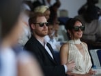 Britain's Prince Harry (L), Duke of Sussex, and Britain's Meghan (R), Duchess of Sussex, attend a charity polo game at the Ikoyi Polo Club in Lagos on May 12, 2024 as they visit Nigeria as part of celebrations of Invictus Games anniversary. (Photo by Kola Sulaimon / AFP)