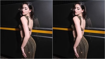 With the help of celebrity fashion stylist Priyanka Kapadia, Ananya kept her accessories to a minimum to let her outfit shine, styling it with just a pair of gold hoop earrings. With the help of hairstylist Aanchal A Morwani, she styled her luscious locks into soft curls and left them open at the side. (Instagram/@ananyapanday) With the help of celebrity fashion stylist Priyanka Kapadia, Ananya kept her accessories to a minimum to let her outfit shine, styling it with just a pair of gold hoop earrings. With the help of hairstylist Aanchal A Morwani, she styled her luscious locks into soft curls and left them open at the side. (Instagram/@ananyapanday)