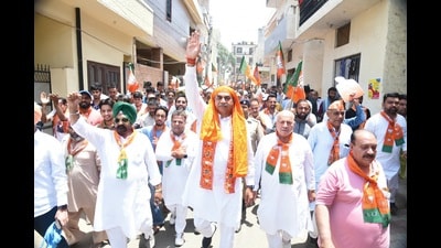 BJP Chandigarh candidate Sanjay Tandon during a foot march in Chandigarh on Sunday. (HT photo)