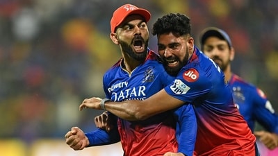 Royal Challengers Bengaluru's Virat Kohli (L) celebrates after taking a catch. (AFP) Royal Challengers Bengaluru's Virat Kohli (L) celebrates after taking a catch. (AFP)