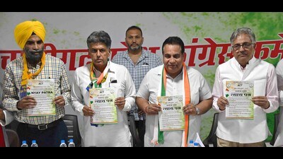 Congress candidate Manish Tewari with INDIA bloc leaders releasing the party manifesto in Chandigarh on Sunday. (Keshav Singh/HT) Congress candidate Manish Tewari with INDIA bloc leaders releasing the party manifesto in Chandigarh on Sunday. (Keshav Singh/HT)
