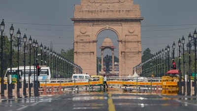 Mirage appears on the Kartvya Path on a hot summer day, in New Delhi, Sunday, (PTI) Mirage appears on the Kartvya Path on a hot summer day, in New Delhi, Sunday, (PTI)