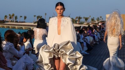 Models present creations of Saudi designer Tima Abid during a show at the Red Sea Fashion Week in Saudi Arabia (AFP) Models present creations of Saudi designer Tima Abid during a show at the Red Sea Fashion Week in Saudi Arabia (AFP)