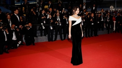 Selena Gomez poses as she leaves after the screening of the film 'Emilia Perez' in Cannes. Her stunning black Saint Laurent ensemble features an off-the-shoulder neckline, a bodycon fit and a floor-length hem. Paired with a Bvlgari necklace and galm makeup, she looked absolutely slayy on the red carpet. (Photo by Sameer Al-Doumy / AFP) Selena Gomez poses as she leaves after the screening of the film 'Emilia Perez' in Cannes. Her stunning black Saint Laurent ensemble features an off-the-shoulder neckline, a bodycon fit and a floor-length hem. Paired with a Bvlgari necklace and galm makeup, she looked absolutely slayy on the red carpet. (Photo by Sameer Al-Doumy / AFP)