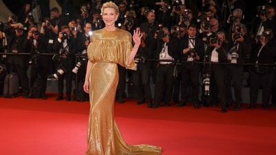 Cate Blanchett stole the show at the Rumours premiere with her dazzling red carpet appearance, wearing a stunning gold gown adorned with crystals across the shoulders. (Photo by Vianney Le Caer/Invision/AP) Cate Blanchett stole the show at the Rumours premiere with her dazzling red carpet appearance, wearing a stunning gold gown adorned with crystals across the shoulders. (Photo by Vianney Le Caer/Invision/AP)