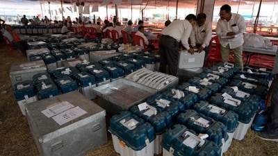 Polling officials collect EVMs and other election material on the eve of the fifth phase of polling in Lucknow.. (AP) Polling officials collect EVMs and other election material on the eve of the fifth phase of polling in Lucknow.. (AP)