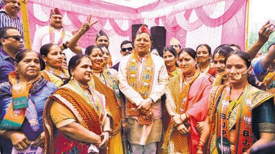 Uttarakhand CM Pushkar Singh Dhami in Patel Nagar in New Delhi on Sunday. (HT Photo) Uttarakhand CM Pushkar Singh Dhami in Patel Nagar in New Delhi on Sunday. (HT Photo)