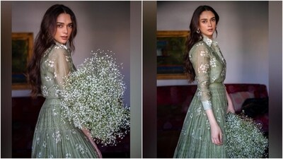Aditi styled her long tresses by leaving them loose in a centre-parting and soft waves. Meanwhile, for the glam picks, she chose feathered brows, rouge on the cheekbones, mascara on the lashes, mauve lip shade, and beaming highlighter.&nbsp; (Instagram)