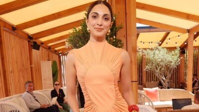 Prior to her appearance at the Women in Cinema Gala, Kiara Advani graced the Red Sea Film Festival in an orange bodycon outfit. Prior to her appearance at the Women in Cinema Gala, Kiara Advani graced the Red Sea Film Festival in an orange bodycon outfit.