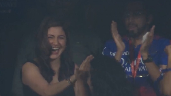 Anushka Sharma high-fived her friend following RCB's win over CSK. Saturday's match helped RCB seal a playoff berth in IPL 2024.