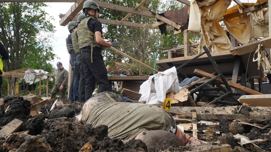 Russian strikes killed at least 10 people, including a pregnant woman, and injured 25 others in two separate attacks in Ukraine's northeastern Kharkiv region on Sunday, local officials said. (AP)
