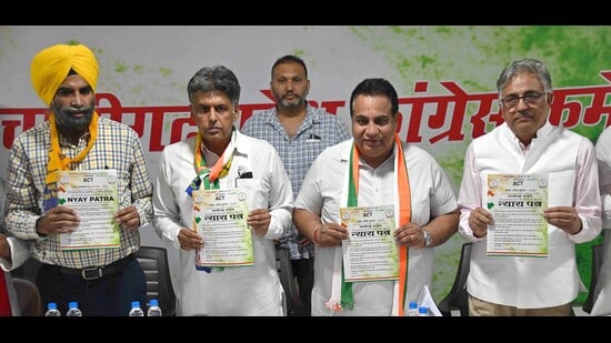 Congress candidate Manish Tewari with INDIA bloc leaders releasing the party manifesto in Chandigarh on Sunday. (Keshav Singh/HT)
