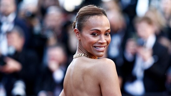 US actress Zoe Saldana arrives for the screening of the film Emilia Perez at the 77th edition of the Cannes Film Festival in Cannes. She is 45.(AFP)