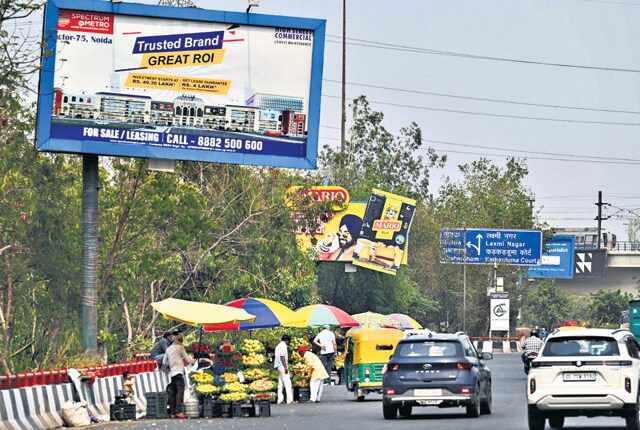 A hoarding and billboard on Vikas Marg in New Delhi. (HT photo) A hoarding and billboard on Vikas Marg in New Delhi. (HT photo)
