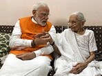 File picture of Prime Minister Narendra Modi meeting his mother Heeraben Modi. (ANI Photo) File picture of Prime Minister Narendra Modi meeting his mother Heeraben Modi. (ANI Photo)