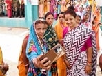 Jharkhand Mukti Morcha (JMM) candidate Kalpana Soren interacts with voters at a polling booth during the Gandey assembly seat by-polls in Giridih district, on May 20. Jharkhand Mukti Morcha (JMM) candidate Kalpana Soren interacts with voters at a polling booth during the Gandey assembly seat by-polls in Giridih district, on May 20.