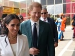 Prince Harry and Meghan Markle were received at the Abuja school by a dancing troupe and a crowd of excited students and teachers.