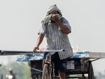 A rickshaw driver wipes his face during high temperatures in New Delhi, India, on Saturday, May 18, 2024. A rickshaw driver wipes his face during high temperatures in New Delhi, India, on Saturday, May 18, 2024.