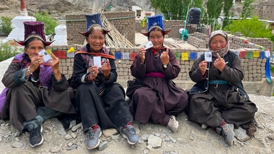Women show their inked fingers in the Union Territory of Ladakh. (PTI) Women show their inked fingers in the Union Territory of Ladakh. (PTI)