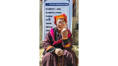 A woman shows her ink-marked finger in Union Territory of Ladakh. (PTI) A woman shows her ink-marked finger in Union Territory of Ladakh. (PTI)