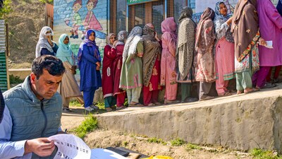 Women wait in a queue outside a polling station in Budgam, Union Territory of Jammu and Kashmir. (PTI) Women wait in a queue outside a polling station in Budgam, Union Territory of Jammu and Kashmir. (PTI)