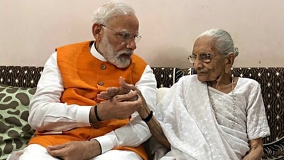 File picture of Prime Minister Narendra Modi meeting his mother Heeraben Modi. (ANI Photo) File picture of Prime Minister Narendra Modi meeting his mother Heeraben Modi. (ANI Photo)