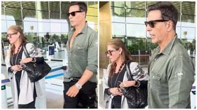 Akshay leaves with Dimple Kapadia at Mumbai airport on Monday. Akshay leaves with Dimple Kapadia at Mumbai airport on Monday.