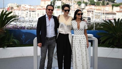 Dennis Quaid, Coralie Fargeat and Demi Moore pose during the photocall. “Through the process of the film, I think I came out with greater acceptance of myself than I am,” Moore said to the press. (AFP)