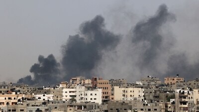 Smoke billows after an Israeli strike on Jabalia as seen from Beit Lahia, in the northern Gaza Strip on May 19, 2024, amid the ongoing conflict between Israel and the militant Hamas group. (AFP) Smoke billows after an Israeli strike on Jabalia as seen from Beit Lahia, in the northern Gaza Strip on May 19, 2024, amid the ongoing conflict between Israel and the militant Hamas group. (AFP)