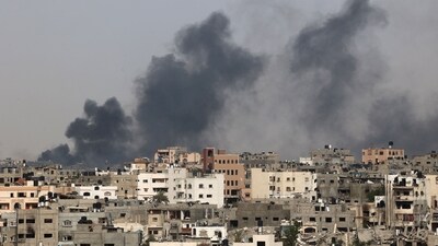Smoke billows after an Israeli strike on Jabalia as seen from Beit Lahia, in the northern Gaza Strip on May 19, 2024, amid the ongoing conflict between Israel and the militant Hamas group. (AFP) Smoke billows after an Israeli strike on Jabalia as seen from Beit Lahia, in the northern Gaza Strip on May 19, 2024, amid the ongoing conflict between Israel and the militant Hamas group. (AFP)