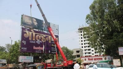 PCMC on Monday pulled down five illegal hoardings, officials said. (HT) PCMC on Monday pulled down five illegal hoardings, officials said. (HT)