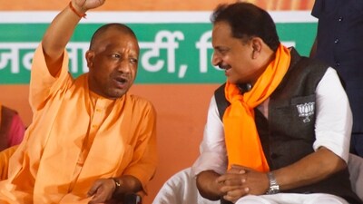 Saran:�Uttar Pradesh Chief Minister Yogi Adityanath with BJP candidate from Saran Lok Sabha constituency Rajiv Pratap Rudy during an election rally, in Saran, Friday, May 17, 2024. (PTI Photo)(PTI05_17_2024_000221A) (PTI) Saran:�Uttar Pradesh Chief Minister Yogi Adityanath with BJP candidate from Saran Lok Sabha constituency Rajiv Pratap Rudy during an election rally, in Saran, Friday, May 17, 2024. (PTI Photo)(PTI05_17_2024_000221A) (PTI)