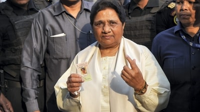 Former Uttar Pradesh CM and BSP chief Mayawati shows her inked finger after casting her vote at a polling station in Lucknow. (PTI) Former Uttar Pradesh CM and BSP chief Mayawati shows her inked finger after casting her vote at a polling station in Lucknow. (PTI)