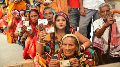 Women show their ID cards as they wait to cast their votes for the fifth phase of Lok Sabha polls, in Hajipur. (PTI) Women show their ID cards as they wait to cast their votes for the fifth phase of Lok Sabha polls, in Hajipur. (PTI)