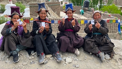 Ladakhi women, dressed in traditional outfits, proudly display their voter ID cards and inked fingers after casting their votes in the fifth phase of the Lok Sabha elections in Ladakh on Monday. (PTI) Ladakhi women, dressed in traditional outfits, proudly display their voter ID cards and inked fingers after casting their votes in the fifth phase of the Lok Sabha elections in Ladakh on Monday. (PTI)