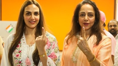 Hema Malini and her daughter Esha Deol show their inked fingers after casting votes for the fifth phase of Lok Sabha elections, in Mumbai. (PTI) Hema Malini and her daughter Esha Deol show their inked fingers after casting votes for the fifth phase of Lok Sabha elections, in Mumbai. (PTI)