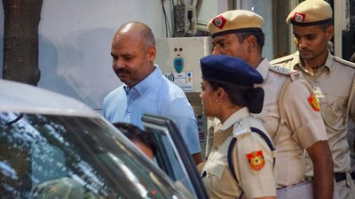 Delhi Police personnel with Chief Minister Arvind Kejriwal's aide Bibhav Kumar come out of Kejriwal's residence after recreation of the scene (PTI) Delhi Police personnel with Chief Minister Arvind Kejriwal's aide Bibhav Kumar come out of Kejriwal's residence after recreation of the scene (PTI)