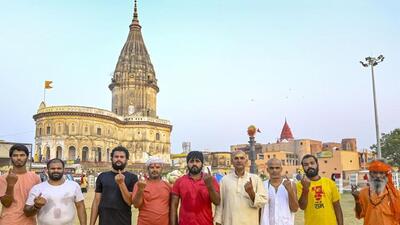 Priests show their inked finger after voting in Ayodhya. (PTI PHOTO) Priests show their inked finger after voting in Ayodhya. (PTI PHOTO)