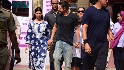 In a moment that made everyone go aww, Shah Rukh held Suhana’s hand as they walked out of the polling station. In a moment that made everyone go aww, Shah Rukh held Suhana’s hand as they walked out of the polling station.