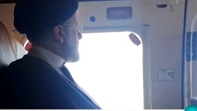 A grab taken from handout video footage released by the Iranian state TV network on Sunday shows Iran's President Ebrahim Raisi on board a helicopter in Azerbaijan. (AFP) A grab taken from handout video footage released by the Iranian state TV network on Sunday shows Iran's President Ebrahim Raisi on board a helicopter in Azerbaijan. (AFP)