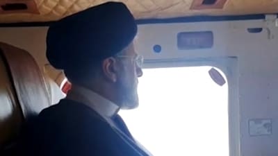 This grab taken from handout video footage released by the IRINN Iranian state television network on May 19, 2024 shows Iran's President Ebrahim Raisi on board a helicopter in the Jolfa region of the western province of East Azerbaijan. (AFP) This grab taken from handout video footage released by the IRINN Iranian state television network on May 19, 2024 shows Iran's President Ebrahim Raisi on board a helicopter in the Jolfa region of the western province of East Azerbaijan. (AFP)