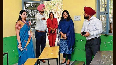 The general observer checking the security arrangements in polling stations of Gill constituency in Ludhiana on Monday. (HT Photo) The general observer checking the security arrangements in polling stations of Gill constituency in Ludhiana on Monday. (HT Photo)