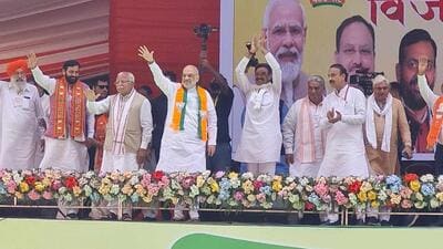 Union home minister Amit Shah along with chief minister Nayab Singh Saini (second from left) and former CM Manohar Lal Khattar at a public meeting in Karnal on Monday. (HT Photo)