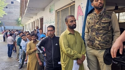 Voters wait in a queue to cast their votes during the fifth phase of Lok Sabha polls, at a polling station in Baramulla. (PIBSrinagar-X) Voters wait in a queue to cast their votes during the fifth phase of Lok Sabha polls, at a polling station in Baramulla. (PIBSrinagar-X)