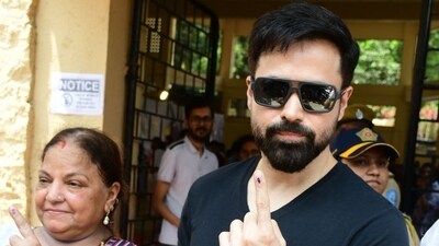 Emraan Hashmi was also seen showing his index finger after casting his vote. Emraan Hashmi was also seen showing his index finger after casting his vote.