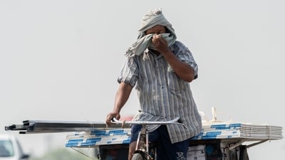 A rickshaw driver wipes his face during high temperatures in New Delhi, India, on Saturday, May 18, 2024. (Bloomberg) A rickshaw driver wipes his face during high temperatures in New Delhi, India, on Saturday, May 18, 2024. (Bloomberg)